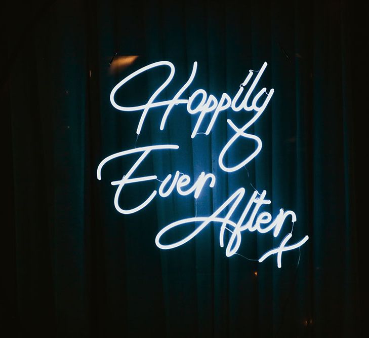 Neon wedding sign reading 'Happily Ever After'