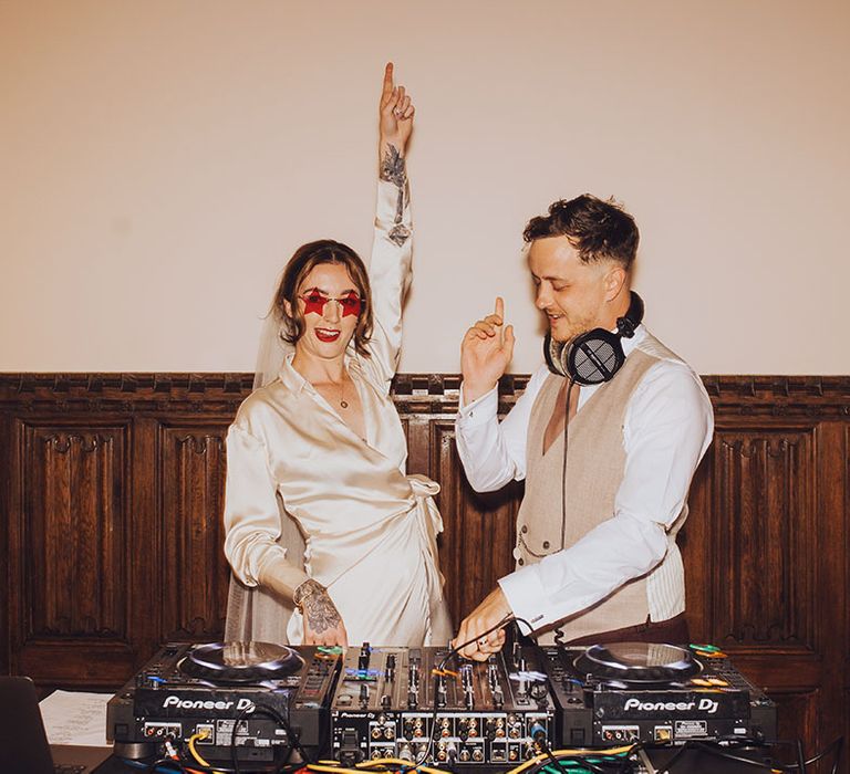 Bride & groom play DJ set on the day of their wedding at St Audries Park