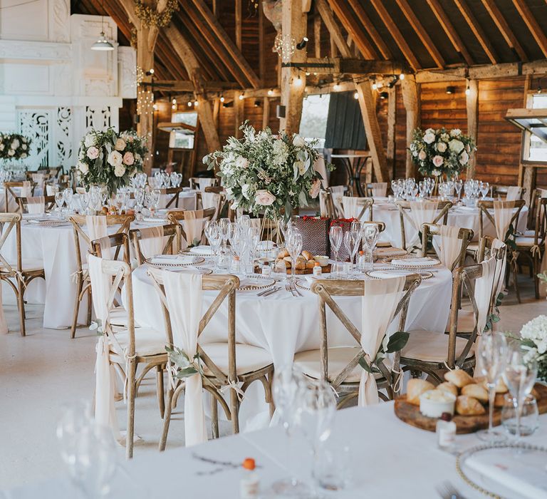 Rustic wedding tablescape at Preston Court in Canterbury with white ad pink wedding tables and DIY place names 