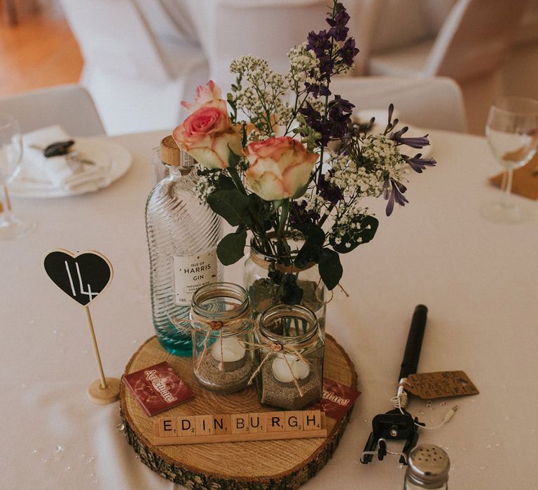 Rustic wedding table name ideas including wooden scrabble based names about locations and places that mean something to the couple 