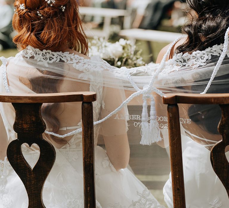 Filipino unity veil and cord ceremony conducted after the same sex outdoor ceremony 