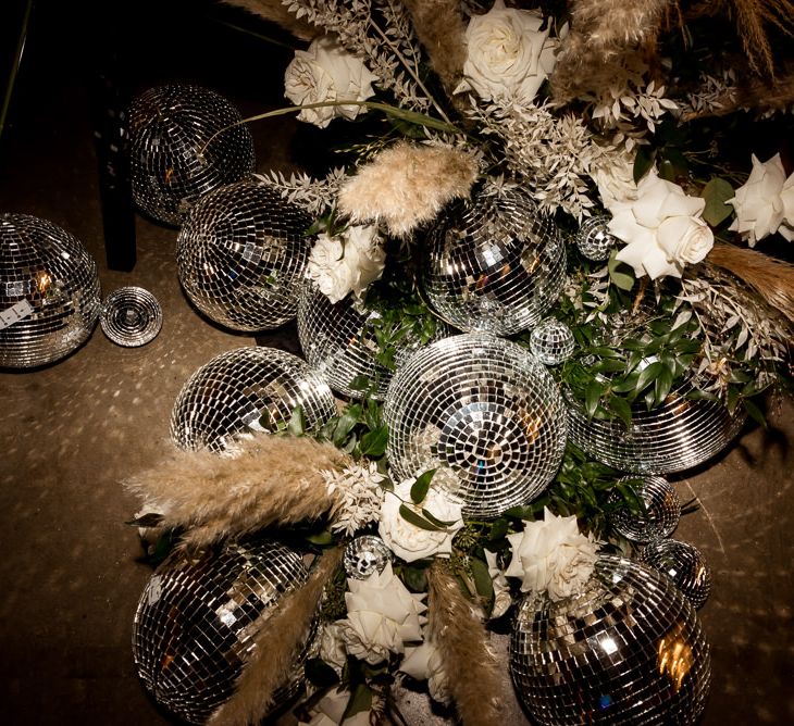 Pampas grass and disco ball wedding decor