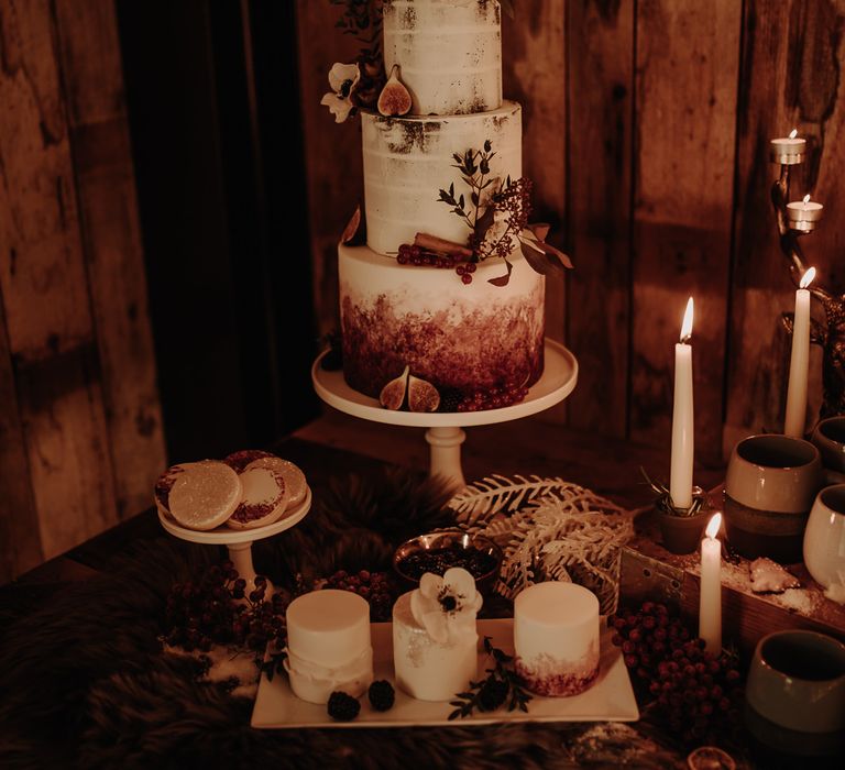 Semi naked wedding cake and candles 