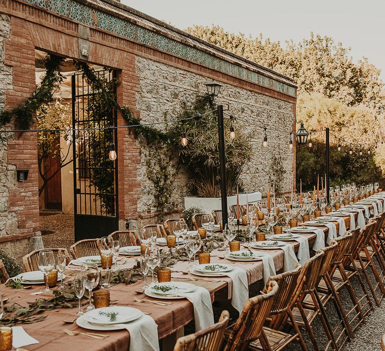 Outdoor wedding reception tablescape planned by Open The Door Events 