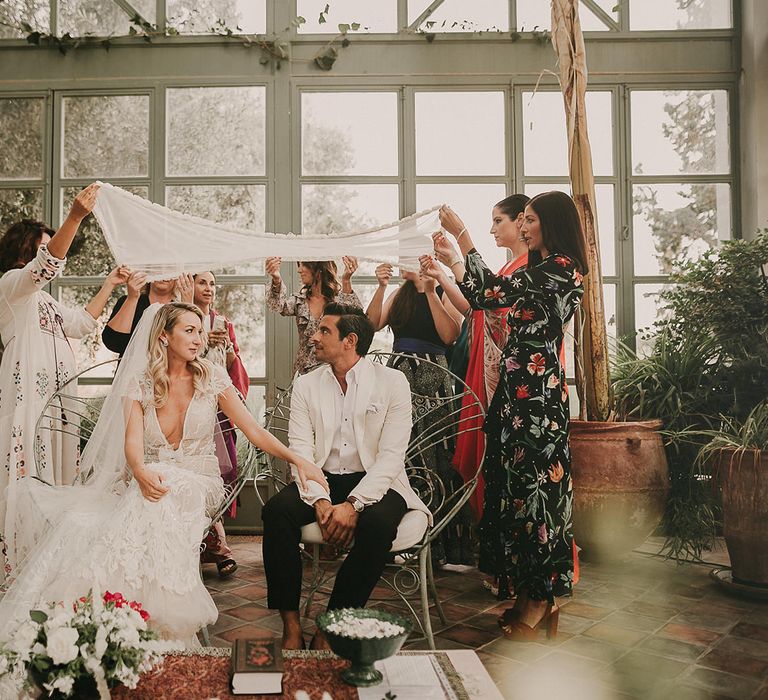 Religious wedding ceremony with canopy 