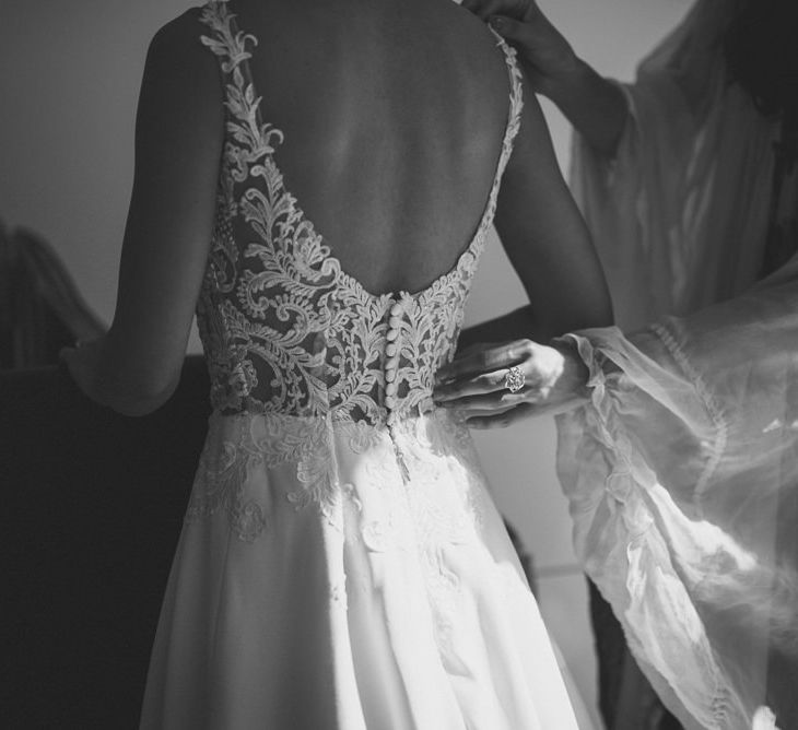 Homemade wedding dress with lace bodice and buttons down the back 