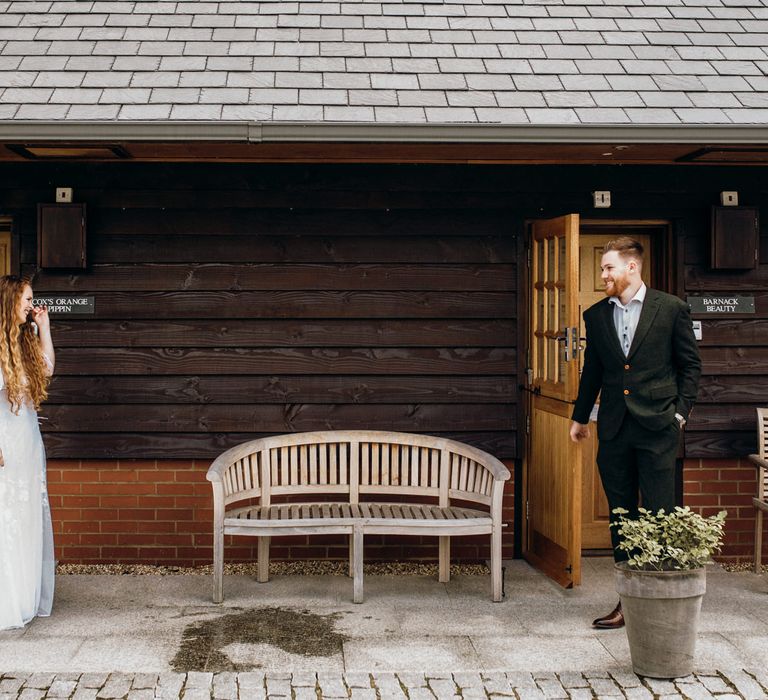 Bride & groom see each other on wedding morning