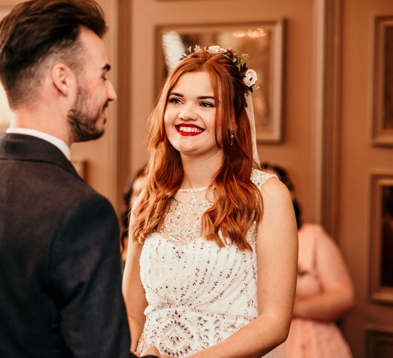 Bride & groom stand together at the Manor House Lindley during wedding ceremony