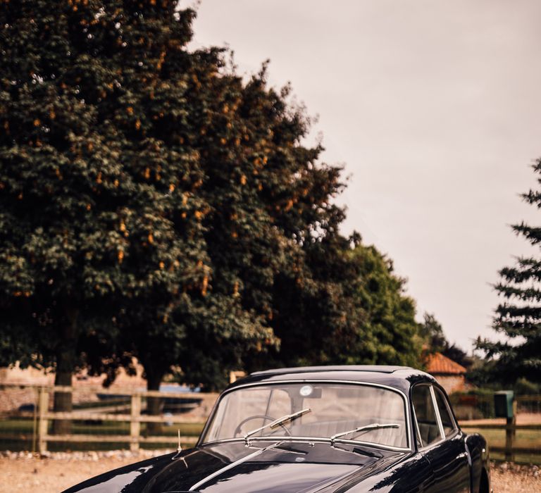 Navy blue vintage wedding car