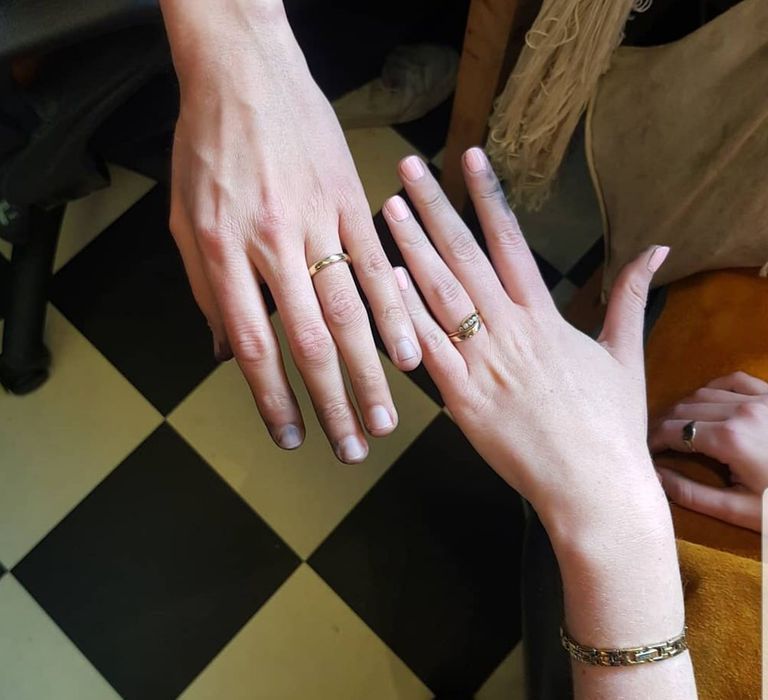 Make your own wedding ring - couple showing off rings