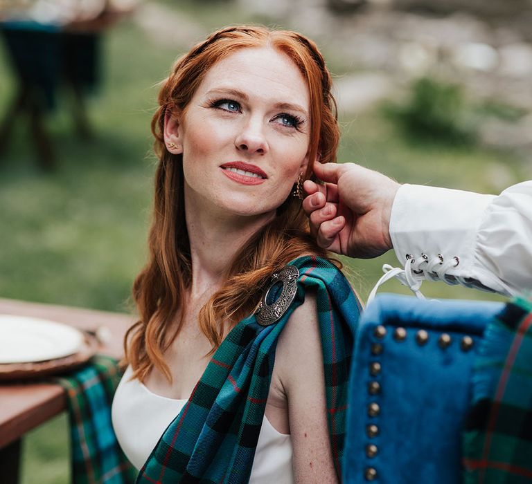 beautiful red headed bride with half up half down wedding hair and natural wedding makeup 