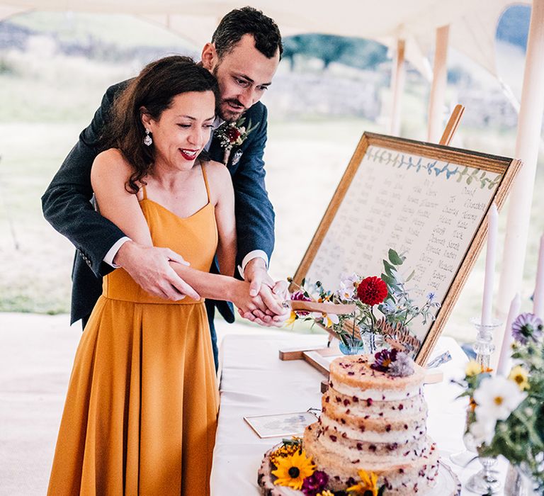 Bride & groom cut their wedding cake