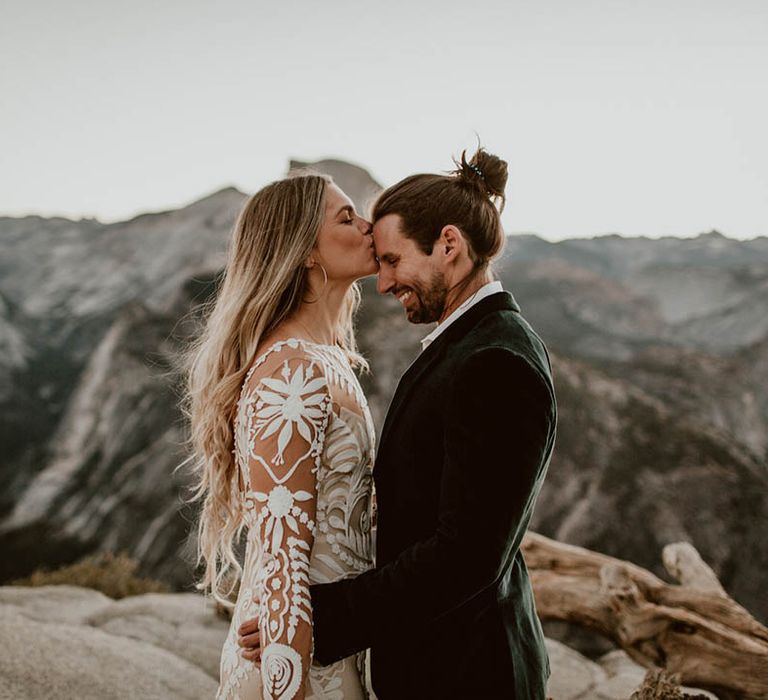 Bride & groom kiss on their wedding day