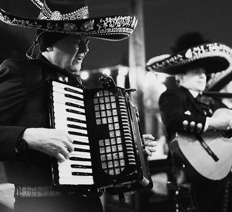 Mariachi band wedding entertainment wearing sombreros entertain the guests