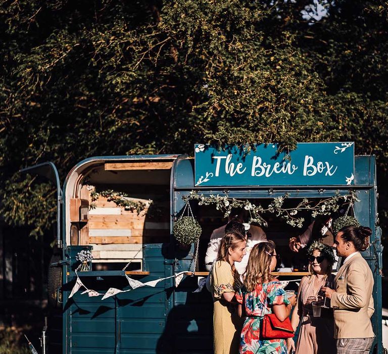 Blue mobile bar called 'The Brew Box' hired from pub for wedding drinks 