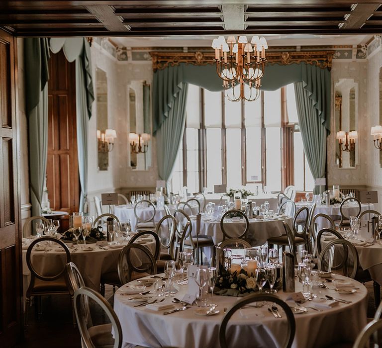 Maften Hall wedding venue reception room with a pale green and white colour scheme 