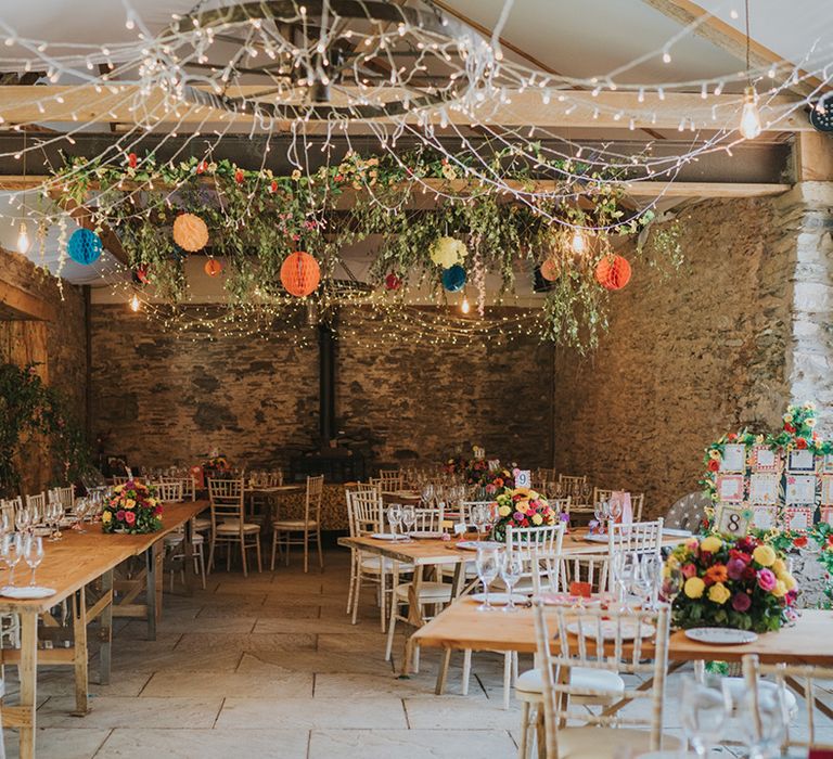 Deers Leap Retreat barn wedding reception with colourful decor and flowers 