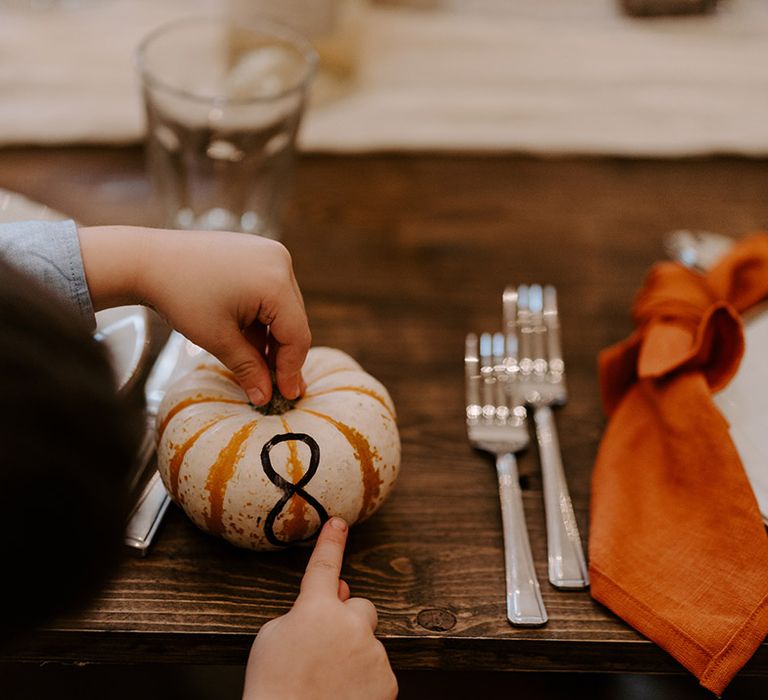 Pumpkin wedding table numbers for the autumn wedding day 