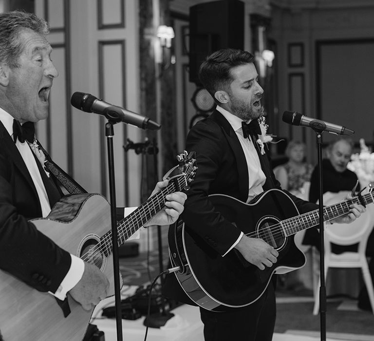 Special live wedding performance between the groom and father of the groom 