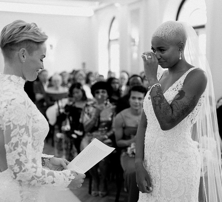 Lesbian wedding at Sant Ffraed House with two brides in lace wedding dresses 