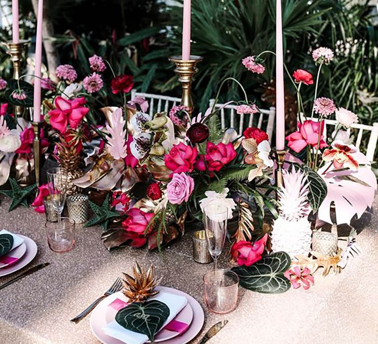 Pink tropical-themed floral table decor by Amy Faith Photography