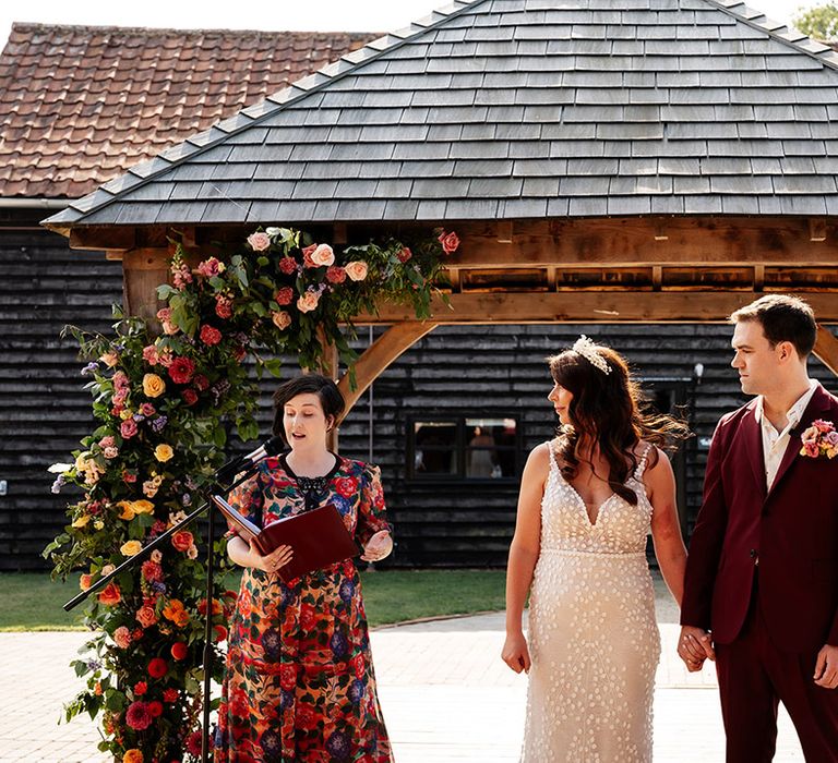 Wedding celebrant with bride and groom for their humanist wedding ceremony at The Canary Shed wedding 