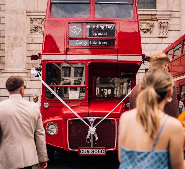 Red double decker bus wedding transport for city wedding 