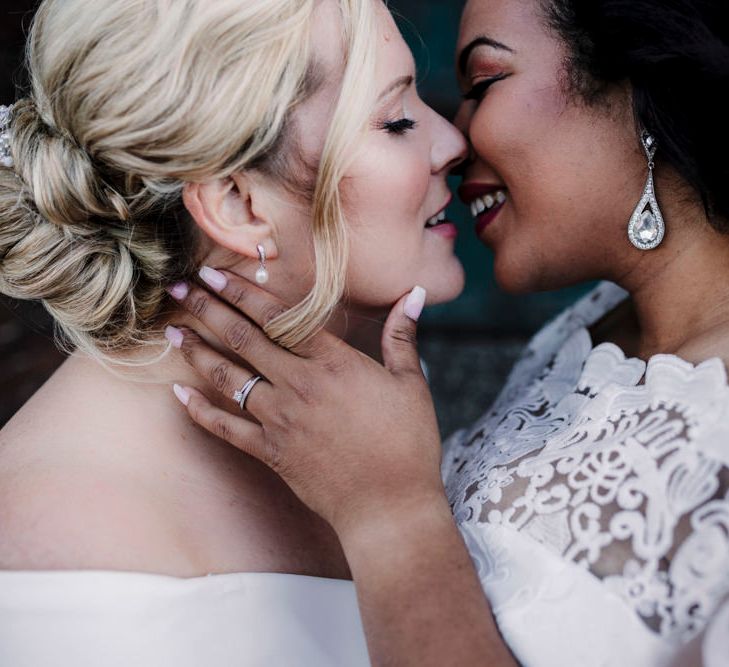 Lesbian brides kissing on their wedding day in Liverpool