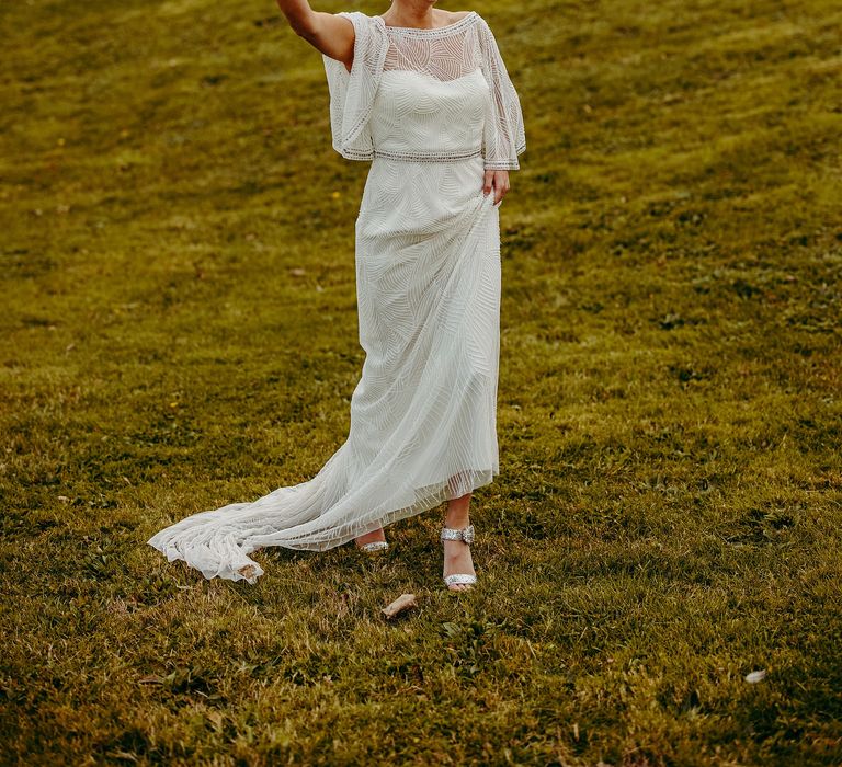 Bride walks through grounds with smoke bomb 