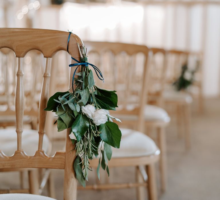 White flower and foliage wedding aisle flowers 