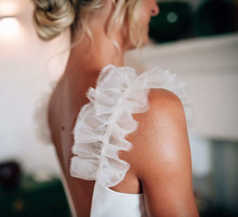 Ruffled straps on the brides Halfpenny London wedding dress