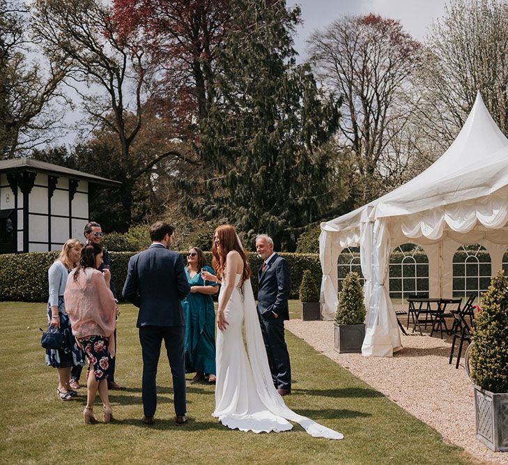 Intimate outdoor marquee reception at The Larmer Tree Gardens in Wiltshire 