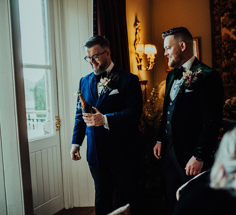 Grooms enter their Wedding receptions as they pop open some Champagne 