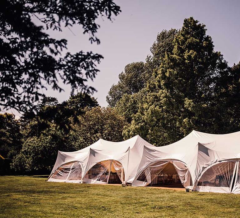 Marquee for the wedding reception after he outdoor wedding ceremony 