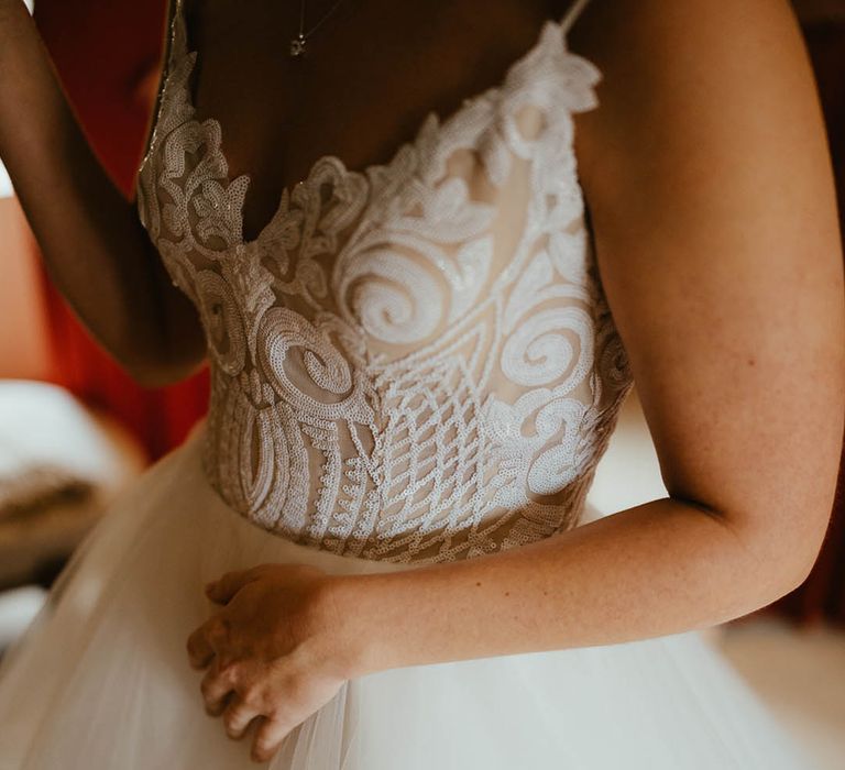 Pretty sequin top detail with tulle skirt wedding dress by Blush by Hayley Paige 