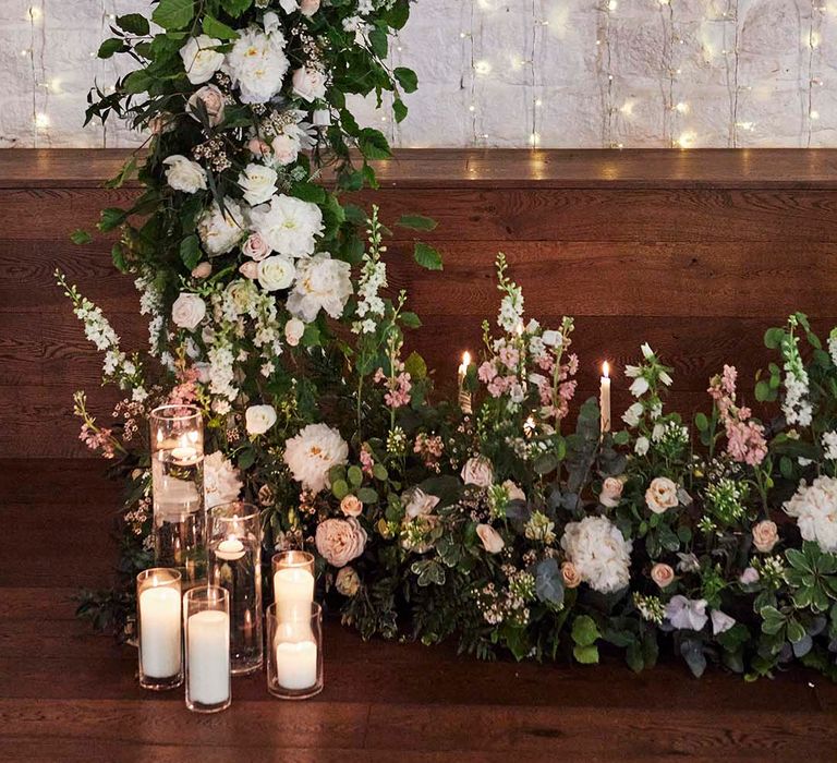 hoop floral arch and fairy light backdrop wedding ceremony decor