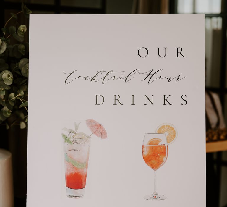 Modern wedding signage complete with watercolour illustration of cocktails 