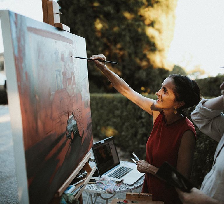 Live wedding painter during Tuscan wedding