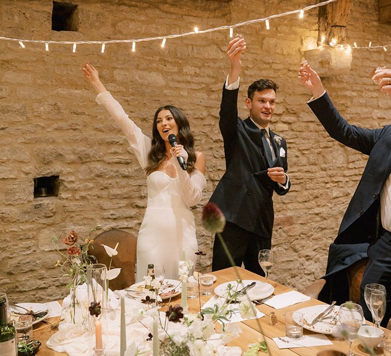 The bride and groom ask everyone to drink their tequila shot wedding favour to celebrate the marriage 