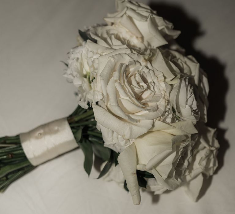 Simple round white rose wedding bouquet for London city wedding 