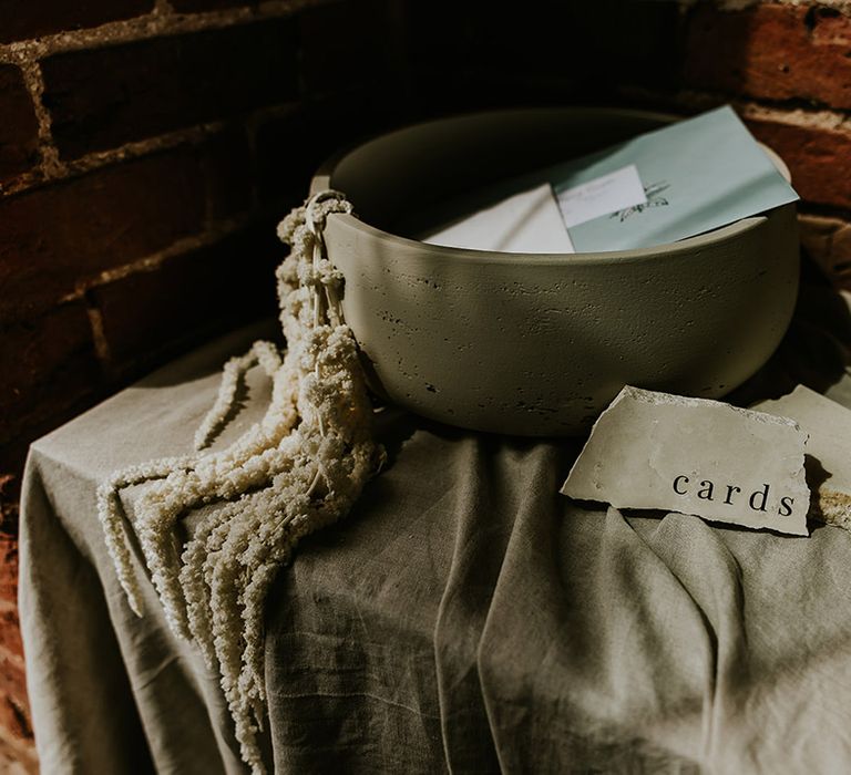 Wedding cards and gifts table signage on rock 