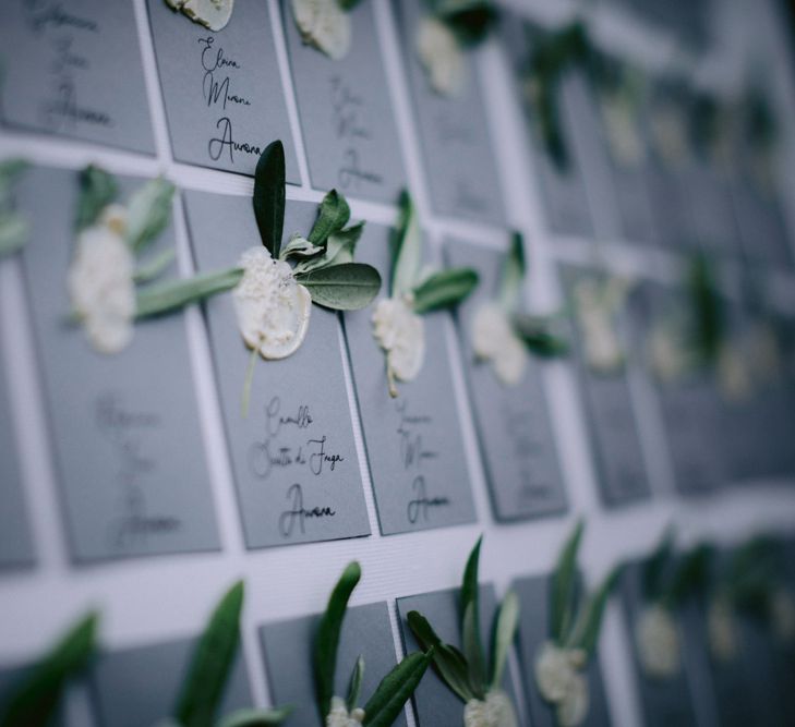 Table plan with wax seals and foliage 