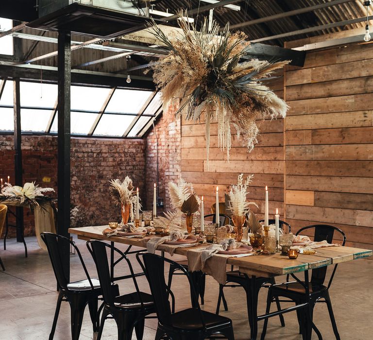 Intimate tablescape at The Shack Revolution with taper candles 