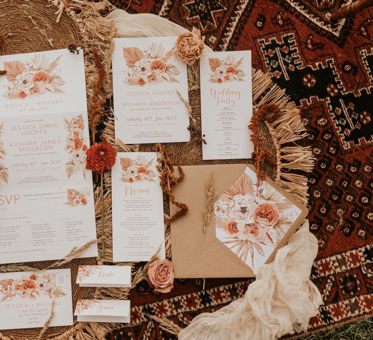 Stationery with floral theme in oranges 