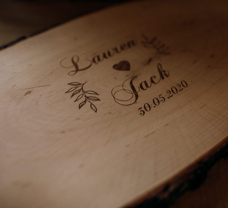 Engraved wooden board at highland wedding in Glencoe