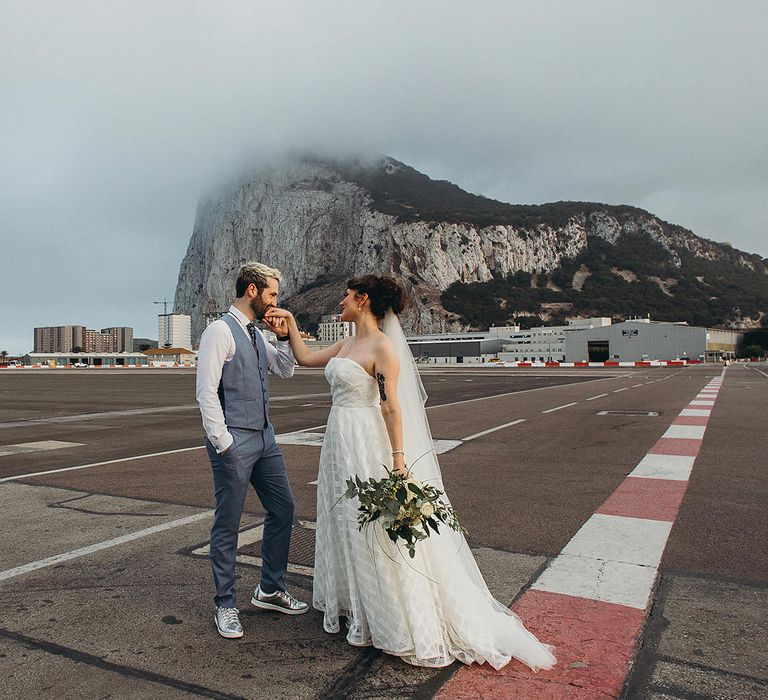 Bride and groom Gibraltar elopement with the iconic rock in the backdrop 