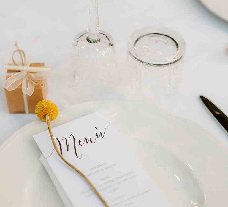 Wedding place setting at romantic Italian wedding