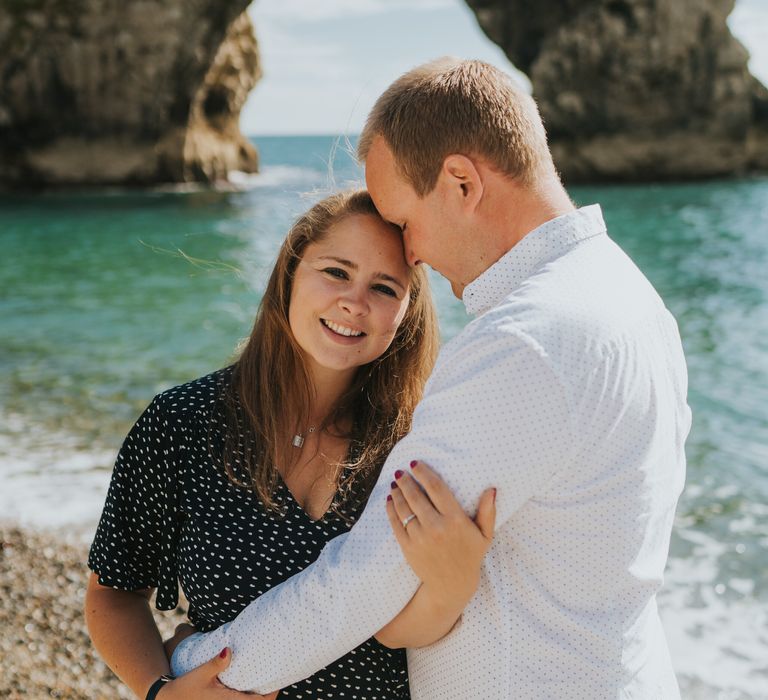 Newly engaged couple at Durdle Door Bay 