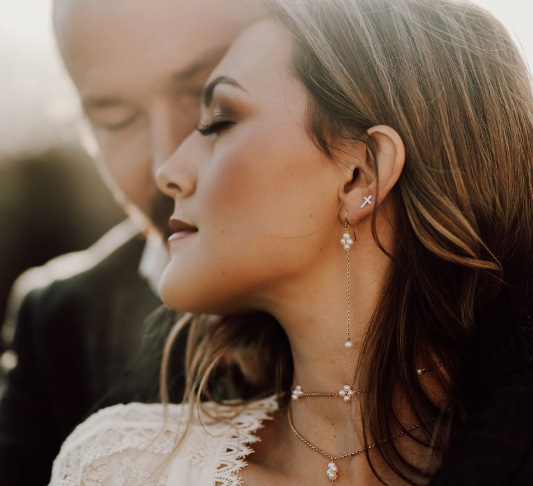 Bride and groom share a moment at boho wedding