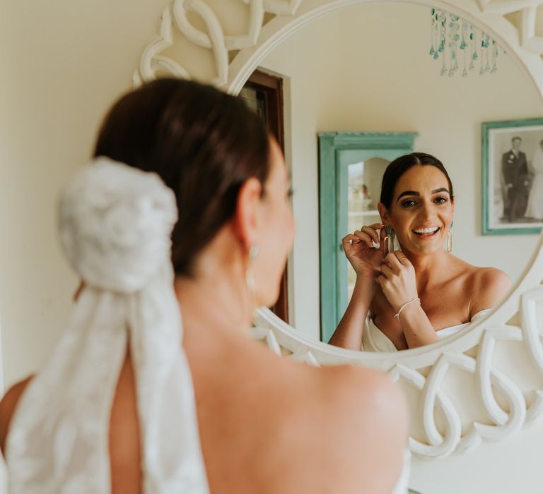 Bridal bun with veil for city hotel wedding